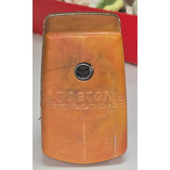 Vintage BOSTON BULLDOG Pencil Sharpener Orange Swirl Bakelite - Picture 1 of 16